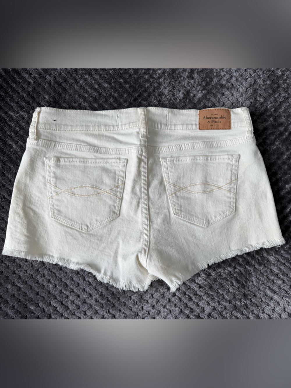 Abercrombie & Fitch  Y2K size 25 Off-White Denim Shorts with Leather Patch